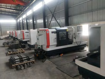 CNC machine shop producing hydraulic components from cast iron bar