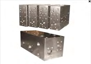 Precision machined iron and steel component blocks